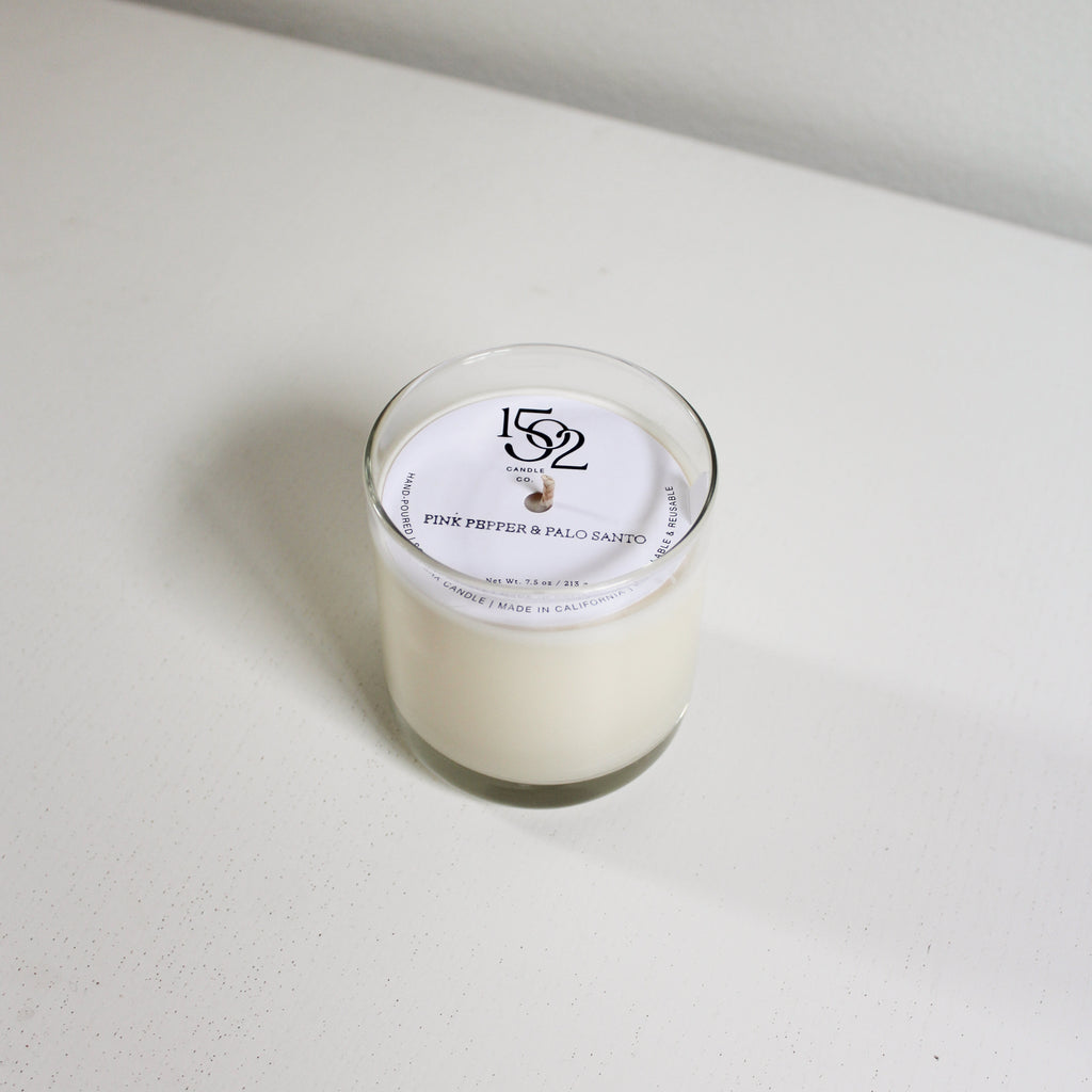 Pink Pepper and Palo Santo soy wax reusable candle.