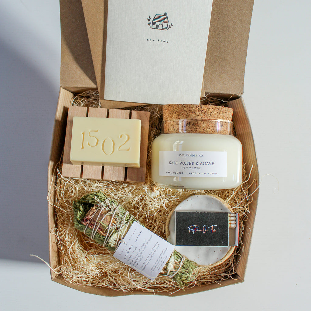 Earth-friendly gift box with handmade candles, soap and ceramics.